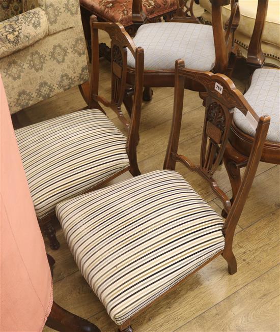A pair of inlaid nursing chairs